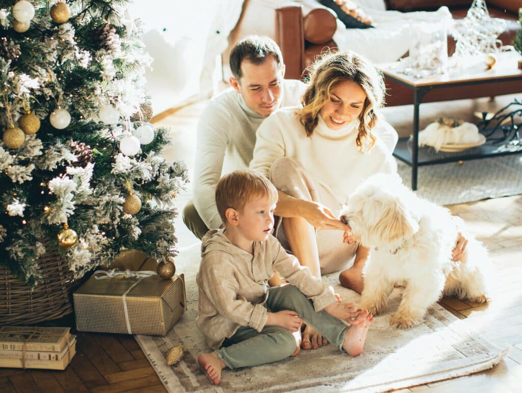 family with dog in holiday home